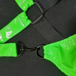 Neon green vinyl rave bra.